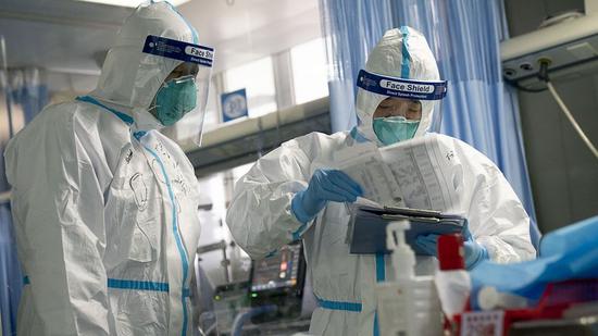 Medical workers in Zhongnan Hospital of Wuhan University in Wuhan, Central China's Hubei province, Jan 24, 2020.(Photo/Xinhua)