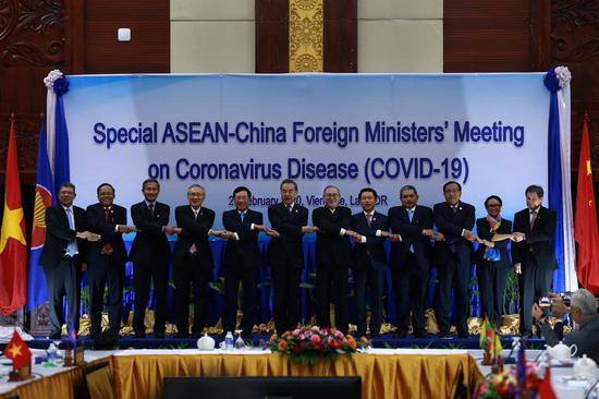 The Special ASEAN-China Foreign Ministers' Meeting on Coronavirus Disease is held in Vientiane, Laos, Feb. 20, 2020. (Photo by Kaikeo Saiyasane/Xinhua) 