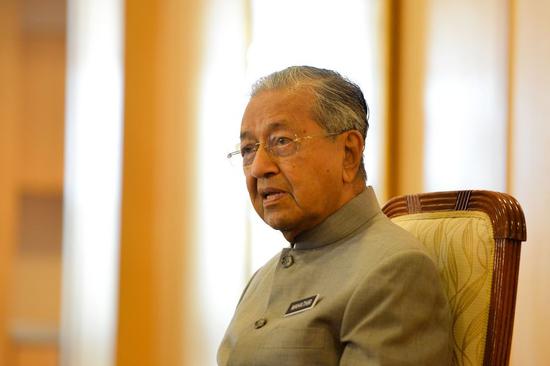 Malaysian Prime Minister Mahathir Mohamad attends a press conference to mark the first year since his Pakatan Harapan (PH) coalition won power at the national polls on May 9 last year, in Putrajaya, Malaysia, May 9, 2019. (Xinhua/Chong Voon Chung)