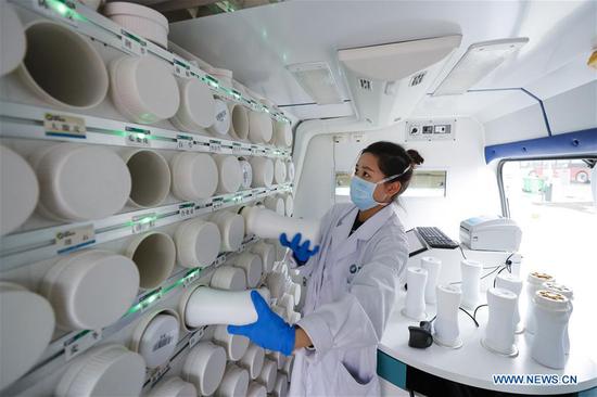 In pics: 1st temporary hospital featuring TCM in Wuhan 