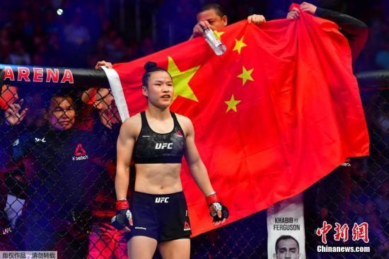 Chinese MMA fighter Zhang Weili celebrates after retaining the strawweight title in UFC248 against Polish Joanna Jedrzejczyk in Las Vegas on March 7, 2020. (Photo/Agencies)