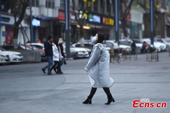 Chongqing lowers coronavirus response level