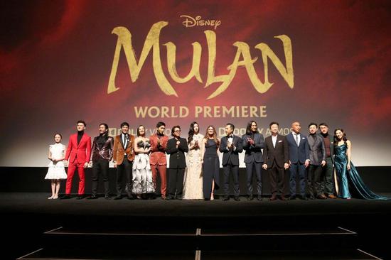 Photo shows the director and cast of Disney's film "Mulan" at the film's world premiere ceremony in Los Angeles, California, the United States, March 9, 2020. (Photo credit: Disney)