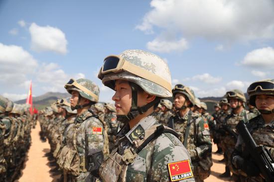 Soliders take part in the opening ceremony of a joint military exercise of Cambodia and China in Cambodia's southwestern Kampot province, on March 15, 2020. (Photo by Cui Songrou/Xinhua)