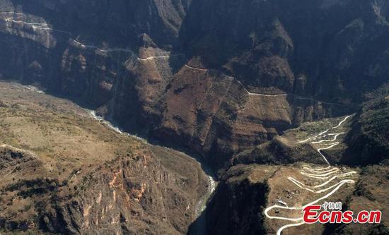 Path out of poverty: Cliff roads constructed in SW China county