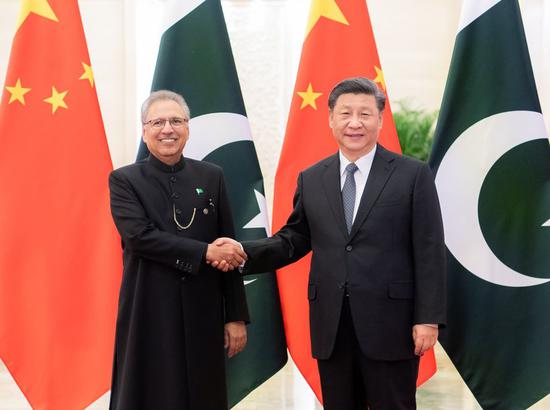Chinese President Xi Jinping holds talks with Pakistani President Arif Alvi at the Great Hall of the People in Beijing, capital of China, March 17, 2020. (Xinhua/Zhai Jianlan)