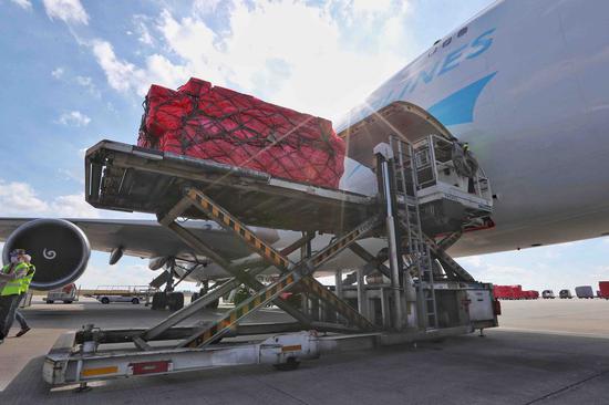 Medical materials from China arrive at the Liege airport in Belgium, on March 18, 2020. A batch of 1 million donated medical masks were flown in Belgium on Wednesday, en route to France. The medical supply was mobilized by two Chinese charities to help combat the spread of COVID-19. (Xinhua/Zheng Huansong)