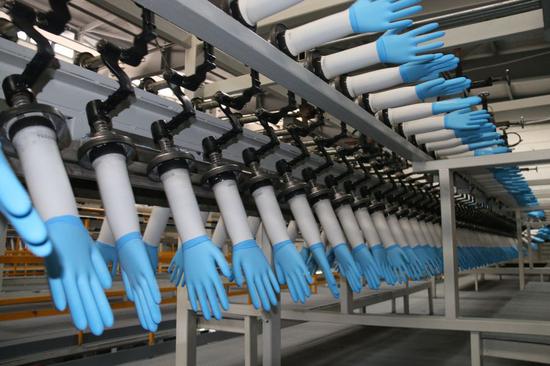 Photo shows a production line of medical gloves in Bluesail Medical Co. Ltd.(Provided by Bluesail Medical Co. Ltd.)