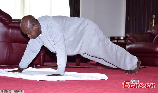 Ugandan president records home workout encouraging citizens to exercise indoors 