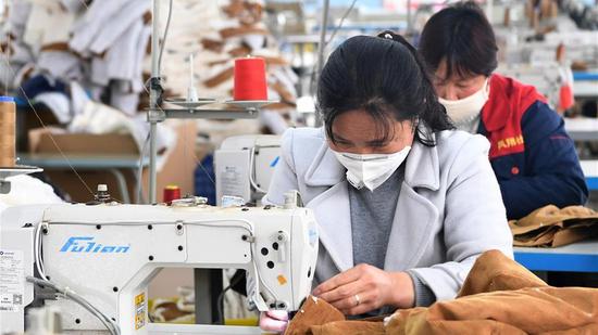 A poverty alleviation workshop in Songxian County of Luoyang, central China's Henan Province, March 12, 2020. (Photo/Xinhua)