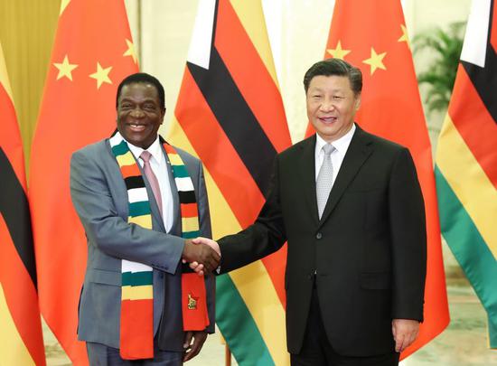 File photo shows Chinese President Xi Jinping (R) meeting with Zimbabwean President Emmerson Mnangagwa at the Great Hall of the People in Beijing, capital of China, Sept. 5, 2018. (Xinhua/Huang Jingwen)
