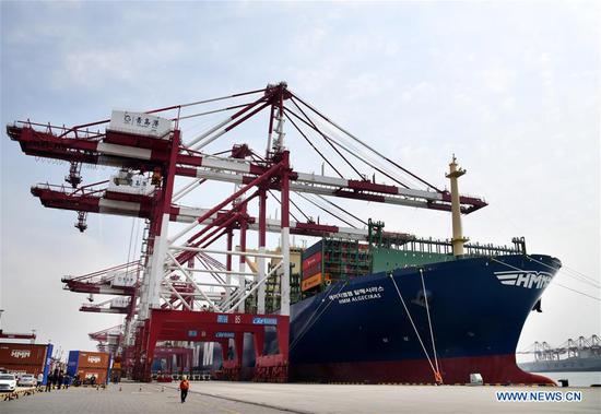 World's largest container ship starts maiden voyage from east China
