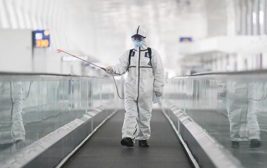 A firefighter conducts disinfection at the Wuhan Tianhe International Airport in Wuhan, central China's Hubei Province, April 3, 2020. (Xinhua/Cheng Min)

