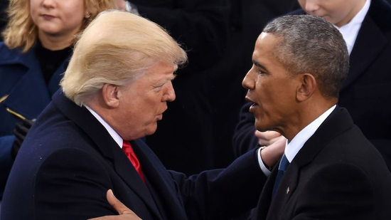 U.S. President Donald Trump (L) is greeted by former President Barack Obama after delivering his inaugural address during the presidential inauguration ceremony at the U.S. Capitol in Washington, DC, U.S., January 20, 2017. （Photo/Xinhua)