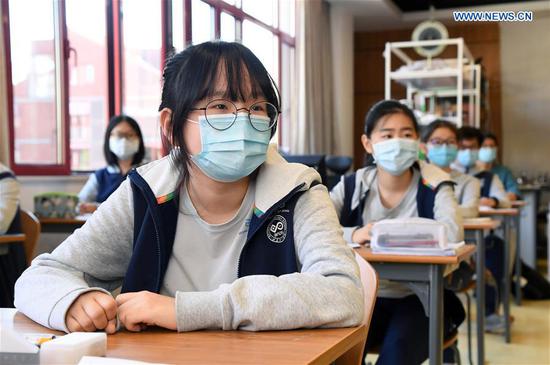 Students attend class at Beijing National Day School - Longyue in Haidian district of Beijing, capital of China, May 11, 2020. (Photo/Xinhua)