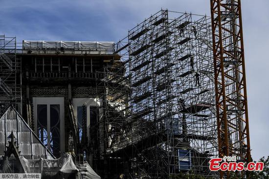 Repair work at Notre Dame resumes as France eases lockdown measures
