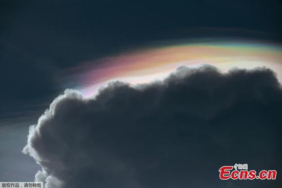 Cloud iridescence, rainbow irisation seen in Thailand