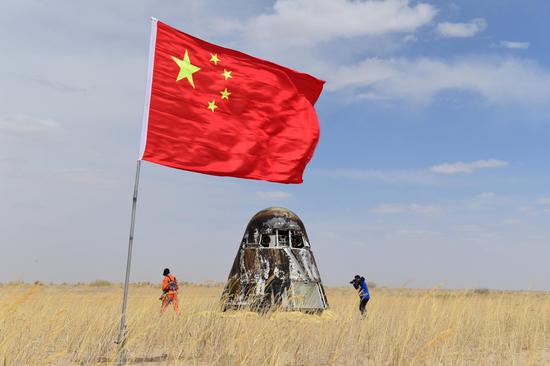 The re-entry module of the prototype of China's new-generation manned spacecraft successfully landed at 1:49 pm on May 8, 2020 at the Dongfeng Landing Site in North China's Inner Mongolia autonomous region. (Photo by Wang Jiangbo/For chinadaily.com.cn)