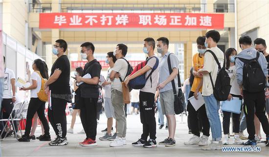 Wuhan holds first offline job fair since virus outbreak