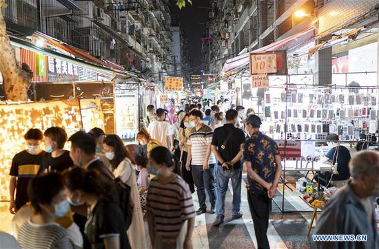 People visit night market in Wuhan