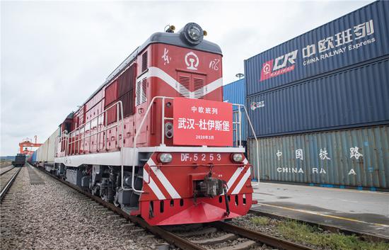 A China-Europe freight train bound for Duisburg of Germany pulls out of the Wuhan terminal of China Railway Intermodal in Wuhan, Central China's Hubei province, March 28, 2020. (Photo/Xinhua)