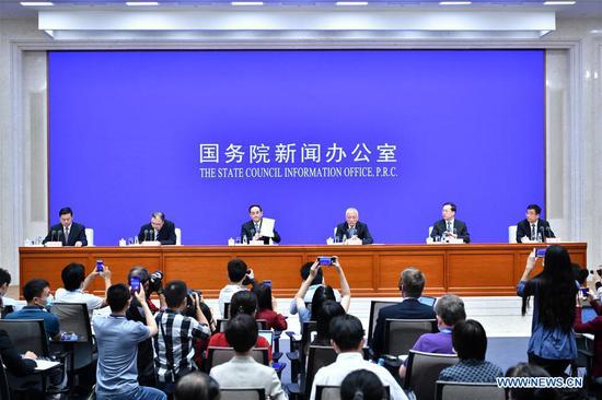 A press conference is held by China's State Council Information Office in Beijing, following the release of a white paper on the country's battle against COVID-19, June 7, 2020. (Photo/Xinhua)