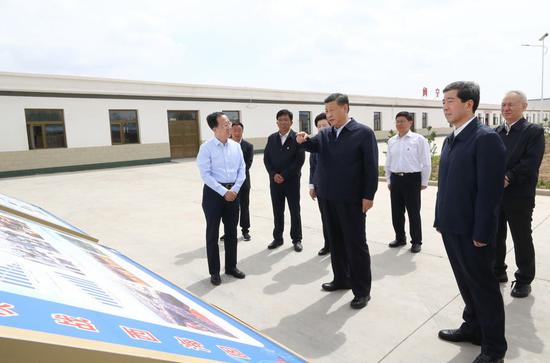 Chinese President Xi Jinping, also general secretary of the Communist Party of China Central Committee and chairman of the Central Military Commission, learns about efforts to advance poverty alleviation in Hongde Village of Wuzhong City, northwest China's Ningxia Hui Autonomous Region, June 8, 2020. Xi inspected Ningxia on Monday. (Xinhua/Ju Peng)
