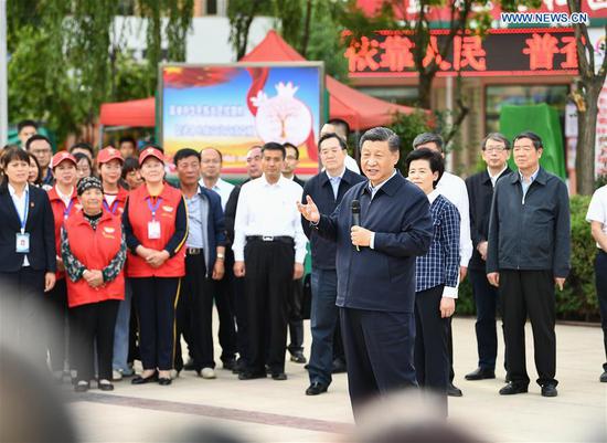 Chinese President Xi Jinping, also general secretary of the Communist Party of China Central Committee and chairman of the Central Military Commission, learns about efforts to promote ethnic unity at Jinhuayuan community in Jinxing Township of Wuzhong City, northwest China's Ningxia Hui Autonomous Region, June 8, 2020. Xi inspected Ningxia on Monday. (Xinhua/Yan Yan)