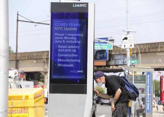 A digital billboard shows information related to COVID-19 in New York, the United States, June 10, 2020. (Xinhua/Wang Ying)