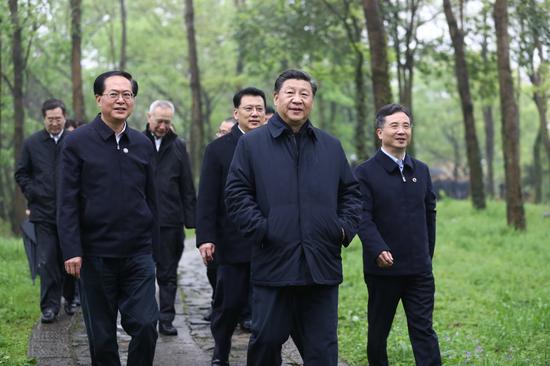 Chinese President Xi Jinping, also general secretary of the Communist Party of China Central Committee and chairman of the Central Military Commission, visits the Xixi National Wetland Park during an inspection in Hangzhou, east China's Zhejiang Province, March 31, 2020. (Xinhua/Ju Peng)