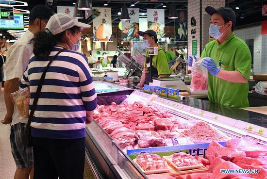 Supermarket chain manages to ensure adequate supply of vegetables, fruits in Beijing