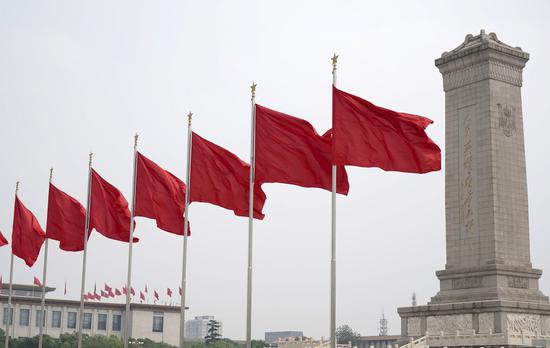 Photo taken on May 21, 2020 shows red flags on the Tian'anmen Square in Beijing, capital of China. (Xinhua/Cai Yang)