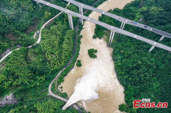 Dam discharges flood as result of heavy rainfalls in Anhui