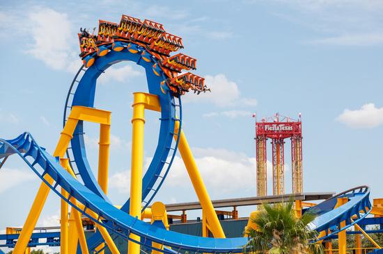 Photo taken on June 20, 2020 shows a roller coaster at the reopened Six Flags Fiesta Texas in San Antonio, Texas, the United States. The famous Six Flags Fiesta Texas reopened to public on June 19. Due to COVID-19 pandemic, the park was closed since mid-March. (Photo by Lie Ma/Xinhua)