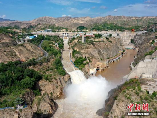 Water gushes out from sluiceway of Liujiaxia Reservoir on Yellow River