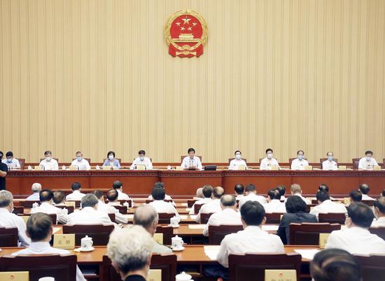 Li Zhanshu, chairman of the National People's Congress (NPC) Standing Committee, presides over the closing meeting of the 20th session of the 13th NPC Standing Committee in Beijing, capital of China, June 30, 2020. (Xinhua/Liu Weibing)