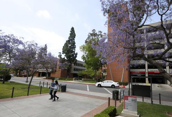 Two Chinese students walk on the campus of the University of Southern California in Los Angeles, California, the United States, June 3, 2019. (Xinhua/Li Ying)