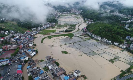 Aerial photo taken on June 5, 2020 shows the flooded Changping Village of Pingxiang City, east China's Jiangxi Province. (Photo by Qiu Hailang/Xinhua)