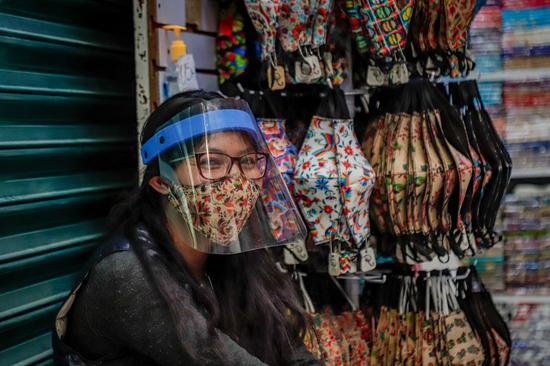 A vendor sells face masks in Mexico City, Mexico, July 17, 2020. (Xinhua)