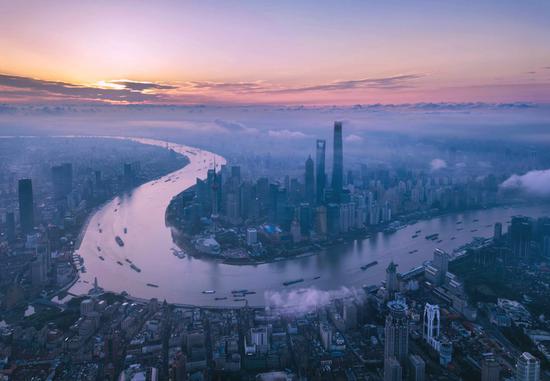 Aerial photo taken on June 21, 2018 shows morning view of the Lujiazui area in Pudong of Shanghai, east China. (Xinhua/Ren Long)