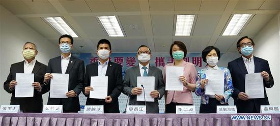 Guests attend a joint statement press conference in Hong Kong, south China, Aug. 9, 2020. (Xinhua/Li Gang)