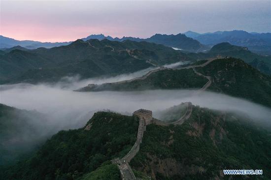Jinshanling Great Wall shrouded in morning mist