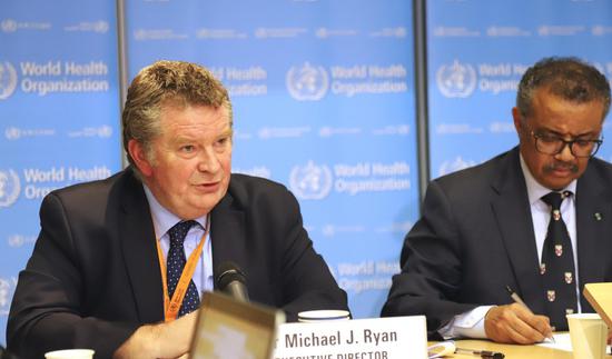 Dr. Michael Ryan(L), executive director of the World Health Organization (WHO) Health Emergencies Program, addresses a press conference in Geneva, Switzerland, Feb. 18, 2020. (Photo by Chen Junxia/Xinhua)