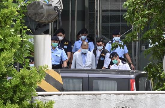 Jimmy Lai Chee-ying is taken by the police to the headquarters of Apple Daily for investigation in Hong Kong, south China, Aug. 10, 2020. (Photo/Xinhua)