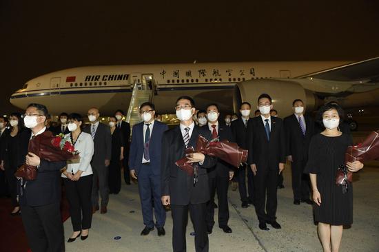 Staff from the Chinese Consulate-General in Houston arrive at the airport in Beijing, capital of China, Aug. 17, 2020. A chartered flight carrying the staff from the Chinese Consulate-General in Houston arrived in Beijing Monday evening. (Xinhua/Yue Yuewei)