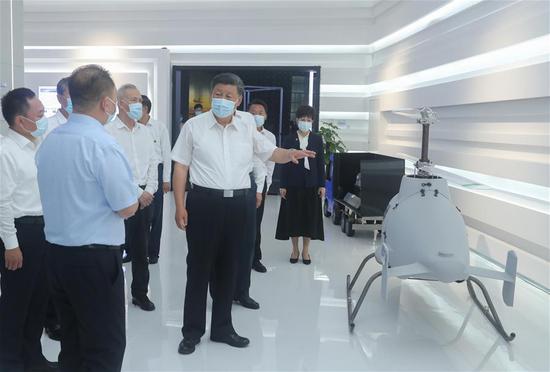 Chinese President Xi Jinping, also general secretary of the Communist Party of China Central Committee and chairman of the Central Military Commission, visits Anhui Innovation Center and learns about the technological innovation and emerging industries of Anhui, in Hefei, capital of east China's Anhui Province, Aug. 19, 2020. Xi inspected Hefei on Wednesday afternoon. (Xinhua/Ju Peng)