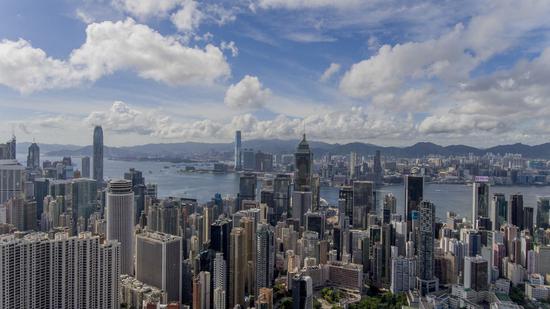 Aerial photo taken on July 16, 2020 shows China's Hong Kong bathing under clear sky. (Xinhua/Lui Siu Wai)