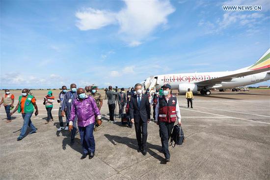 A team of Chinese medical experts arrive at the airport in Conakry, Guinea, Aug. 27, 2020. A team of Chinese medical experts to aid the anti-epidemic fight in Guinea arrived at Conakry on Thursday and will stay in the country for 10 days. (Chinese Embassy in Guinea/Handout via Xinhua)