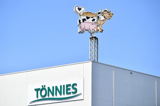 Photo taken on June 24, 2020 shows the logo of the meat processing company Toennies in Guetersloh, Germany. (Photo by Ulrich Hufnagel/Xinhua)