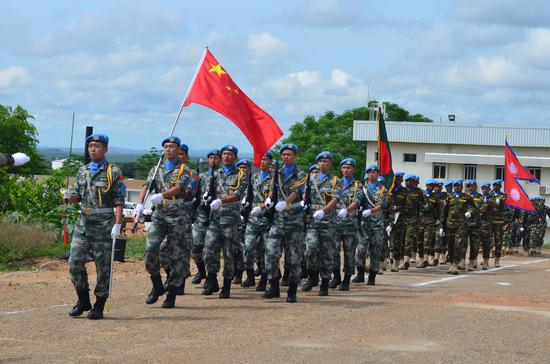 Chinese peacekeepers march during the celebrations to mark International Day of the United Nations Peacekeepers in Juba, capital of South Sudan, May 29, 2019. (Xinhua/Denis Elamu)